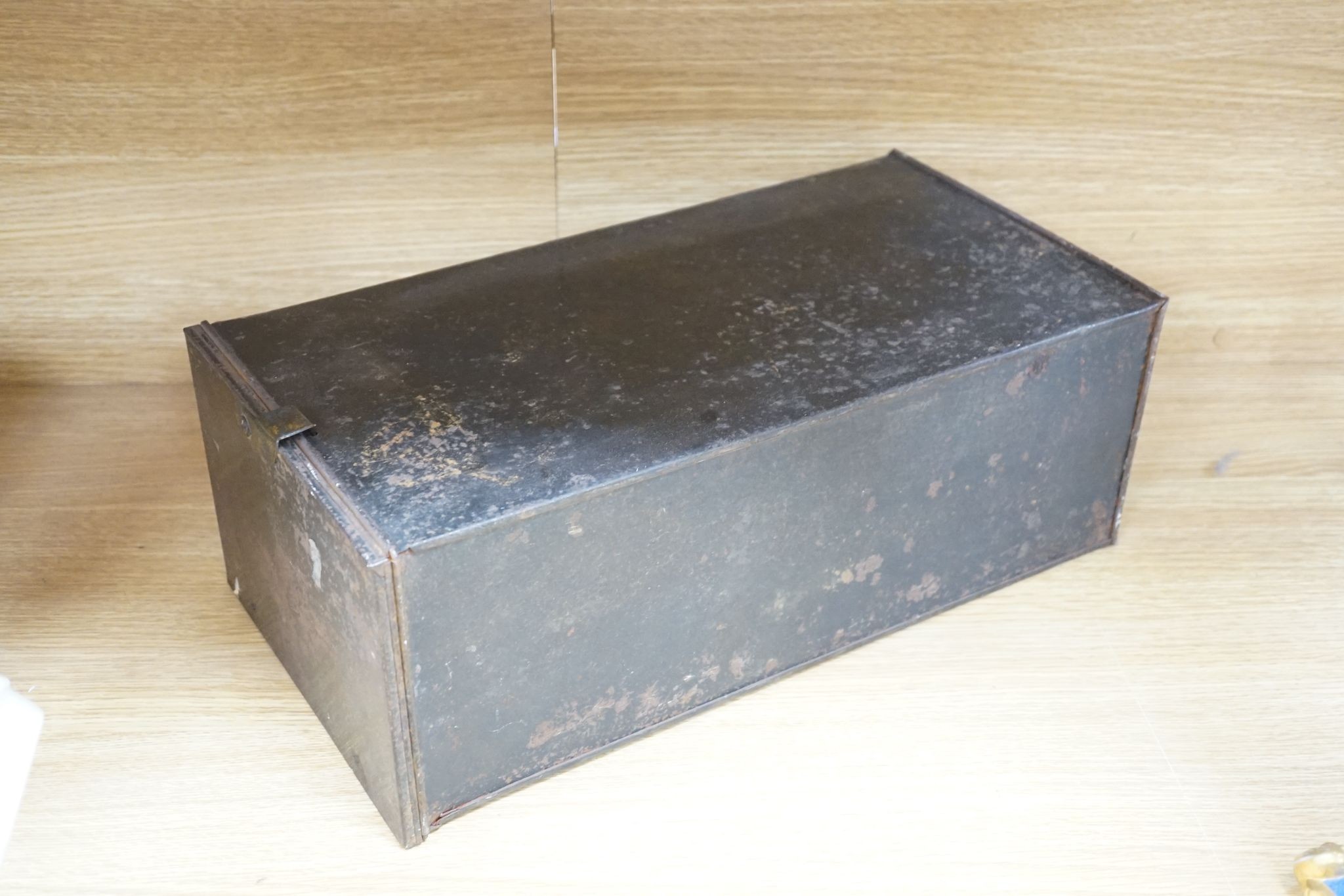 A cased tinplate and pressed brass Magic Lantern, Case 46 cm long